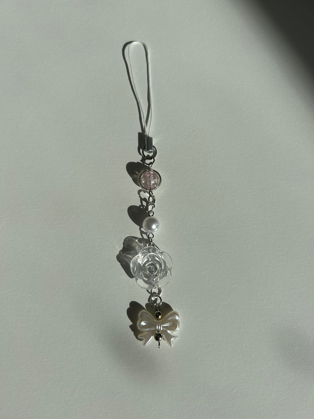 Roseglass Sonata charm sling