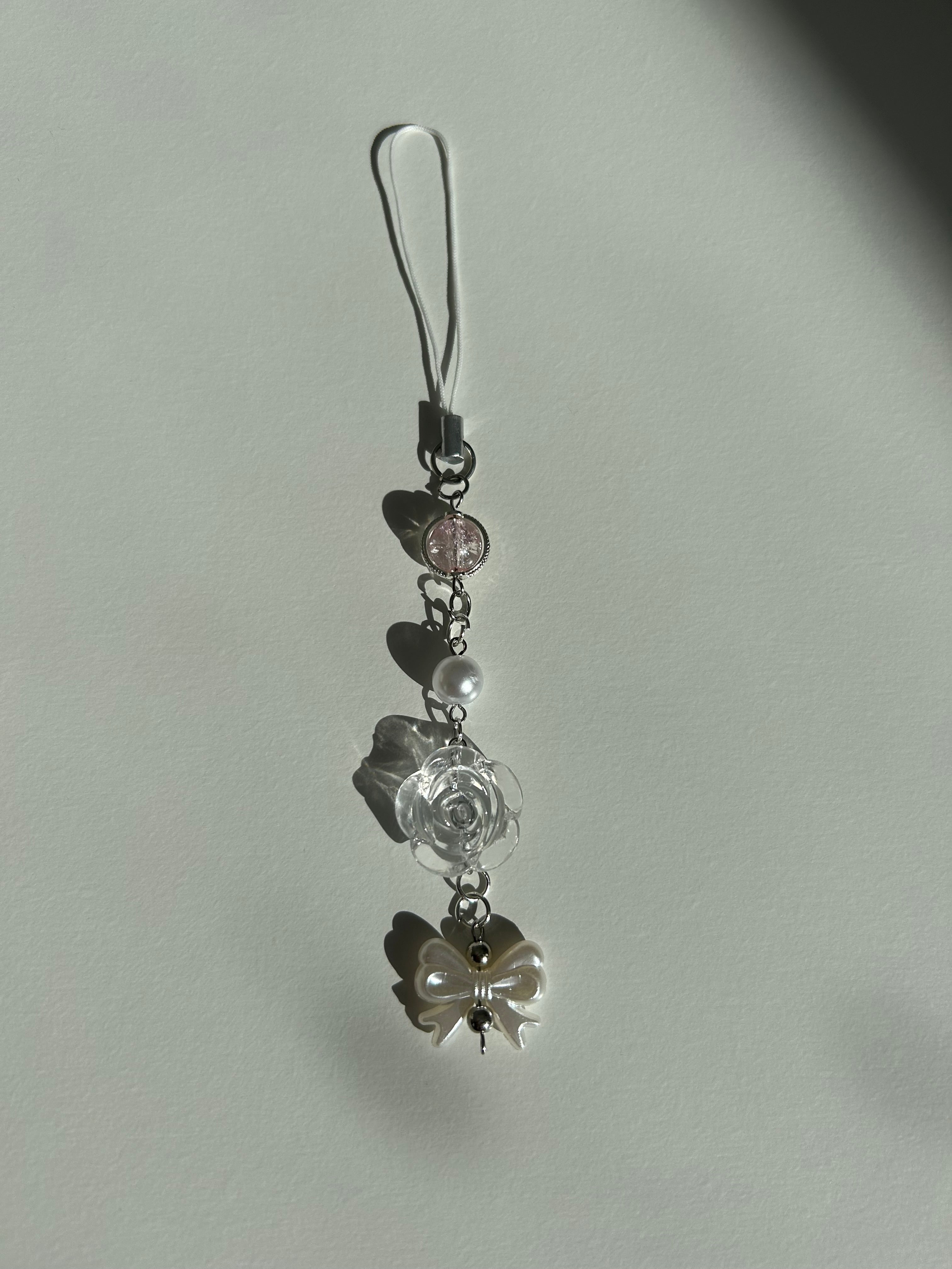 Roseglass Sonata charm sling