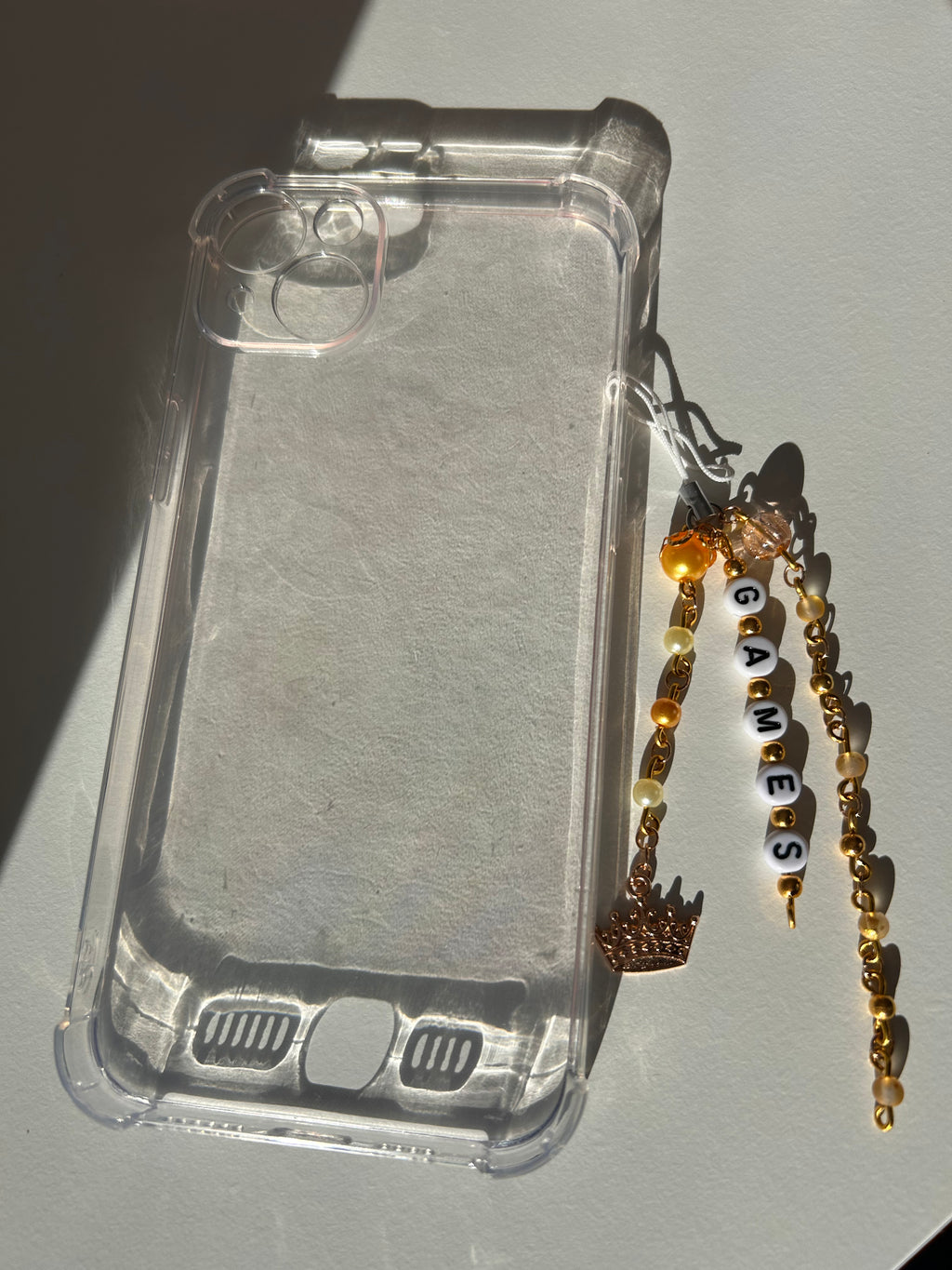 Twisted Games Charm Sling