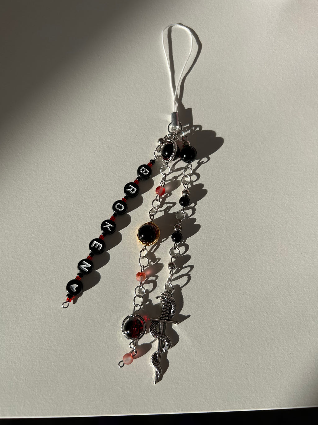 Broken Whispers Charm Accessory