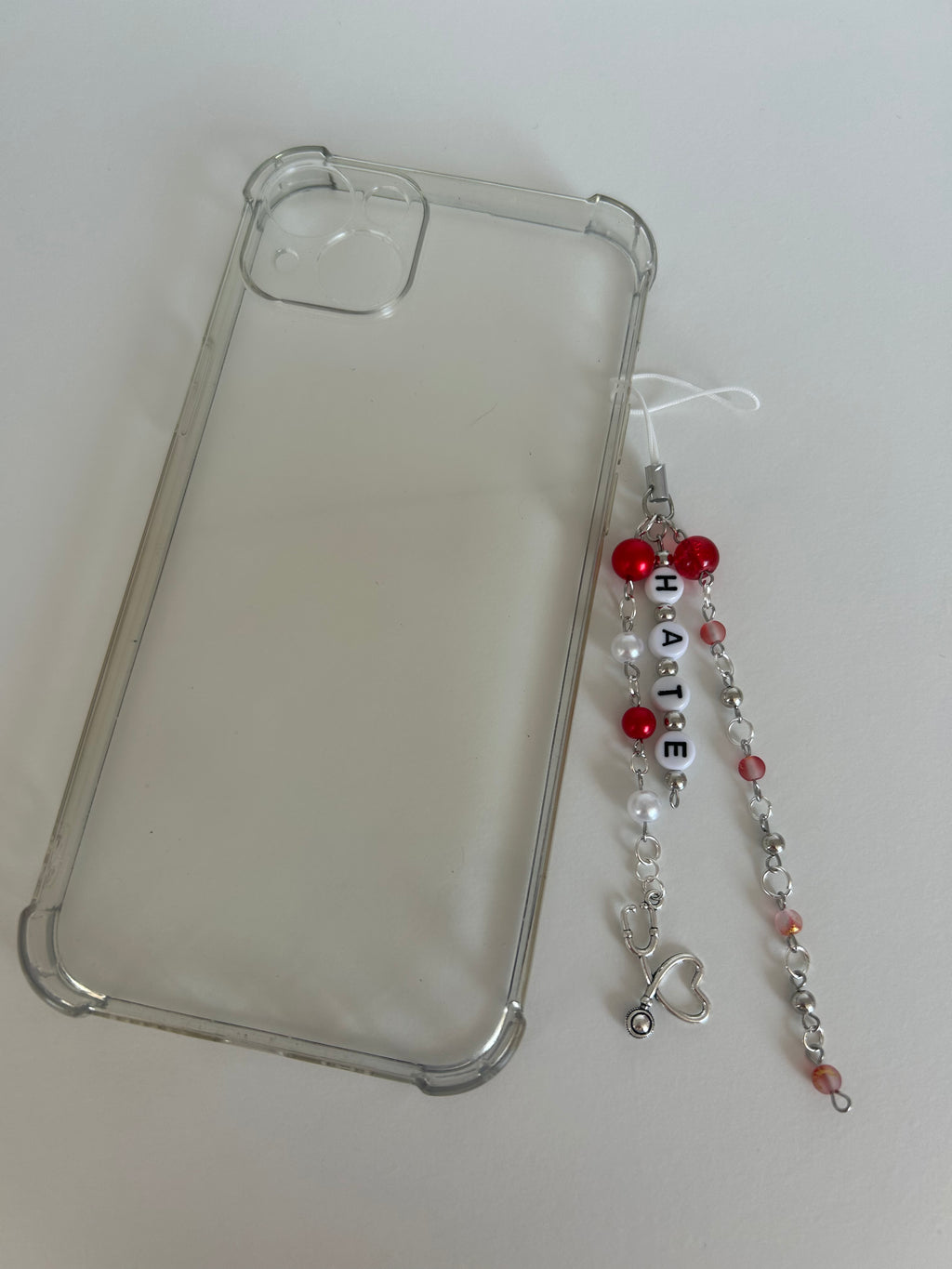 Twisted Hate Charm Sling